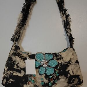 Hand Crafted Black and Cream Shoulder Bag with Elegant Design